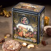 Nostalgic tin surrounded by Elisen gingerbread cookies and Christmas pastries Nostalgic tin surrounded by Elisen gingerbread cookies and Christmas pastries