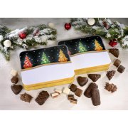 Preview of logo printing options on gingerbread tin, surrounded by confectionery and decorations Preview of logo printing options on gingerbread tin, surrounded by confectionery and decorations
