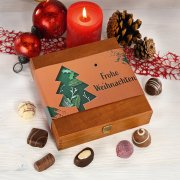 Assorted chocolate truffles in a wooden gift box Assorted chocolate truffles in a wooden gift box