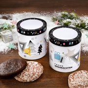 Two Christmas Gift Tins Surrounded by Nuremberg Elisen Gingerbread Cookies and Christmas Decorations Two Christmas Gift Tins Surrounded by Nuremberg Elisen Gingerbread Cookies and Christmas Decorations